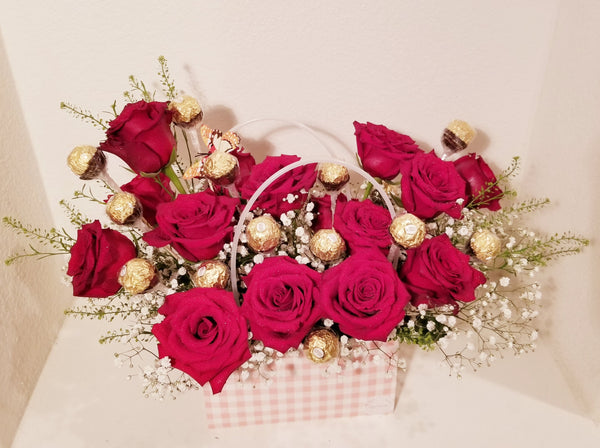Sweet 16th Handbag Arrangement of fragrant 16 red Roses and 16 Ferrero Rocher Fine Hazelnut Chocolates