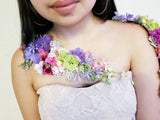 Wearable Flowers – Mix flowers cascading floral tattoo that would wrap over her shoulder and chest.