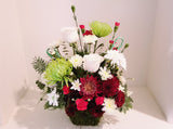 Christmas Seasonal Arrangement in Preserved Moss Basket