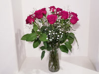 Dozen Red Roses Arrangement in Clear Vase