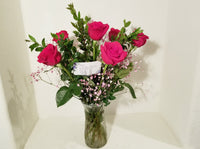 Half Dozen Roses Arrangement In Clear Vase