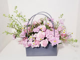 Roses and Seasonal Handbag Arrangement