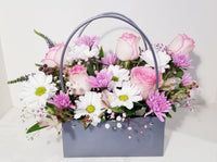 Roses and Seasonal Handbag Arrangement