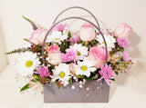 Roses and Seasonal Handbag Arrangement