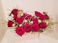 Sweet 16th Handbag Arrangement of fragrant 16 red Roses and 16 Ferrero Rocher Fine Hazelnut Chocolates