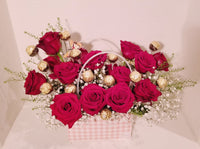 Sweet 16th Handbag Arrangement of fragrant 16 red Roses and 16 Ferrero Rocher Fine Hazelnut Chocolates