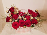 Sweet 16th Handbag Arrangement of fragrant 16 red Roses and 16 Ferrero Rocher Fine Hazelnut Chocolates