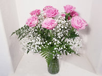 Dozen Red Roses Arrangement in Clear Vase