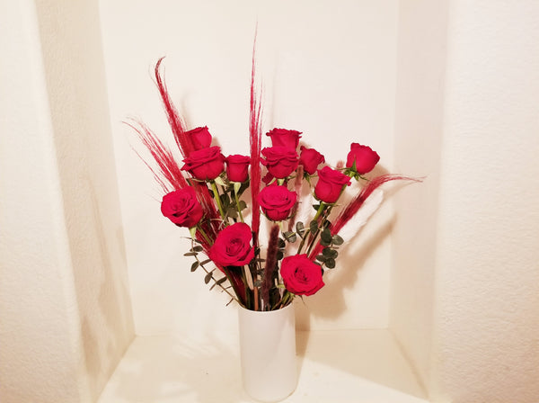 Morden Arrangement design using dozen red Roses, pampas grass and Bunny tail. 