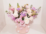 Imagine this gorgeous flower arrangement getting delivered to your door... dreamy! Pink, lavender and creamy flowers such as roses, spray roses, stocks tulips, snapdragons chrysanthemum sophistically arranged with lush greenery and fillers. (Flower: Flowers/Hatbox Color and variety may vary) 