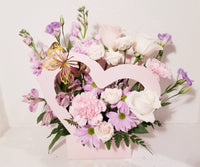 Celebrate your love phase with the Young Love Arrangement, which has a stunning mix of lavender, creamy and pink flowers such as roses, spray roses, stocks, snapdragons, Mums sophistically arranged with lush greenery and fillers. The perfect romantic gift to send to the one who's always on your mind and in your heart!