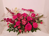 Valentine basket arrangement, which has a stunning mix of roses, spray roses, fancy carnation, spray carnations, Alstroemerias, sophistically arranged with lush greenery and fillers.  