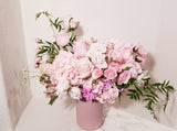 Angelynn II - Soft and delicate, Angelynn is designed with gorgeous Hydrangeas, fragrant Roses, Alstroemerias, Daisy and a mix of beautiful textures arrangement. 