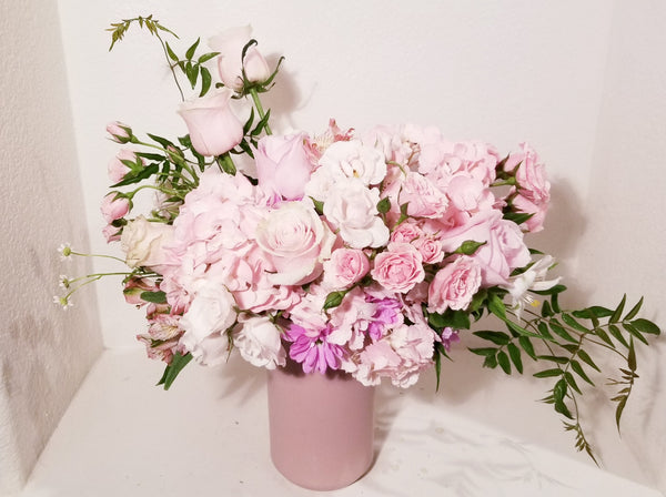 Angelynn II - Soft and delicate, Angelynn is designed with gorgeous Hydrangeas, fragrant Roses, Alstroemerias, Daisy and a mix of beautiful textures arrangement