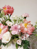 Mom's Garden Party - This arrangement is delightful flower arrangement featuring a mix of Peonies Roses, Queen Ann Lace and seasonally available blooms, thoughtfully designed in a ceramic vase.