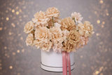 Blushing Petals Box - A breathtaking floral arrangement in the French style, showcasing a trio of romantic roses soft pink tones in gentle, sophisticated colors.