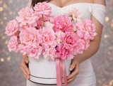 Blushing Petals Box - A breathtaking floral arrangement in the French style, showcasing a trio of romantic roses soft pink tones in gentle, sophisticated colors.