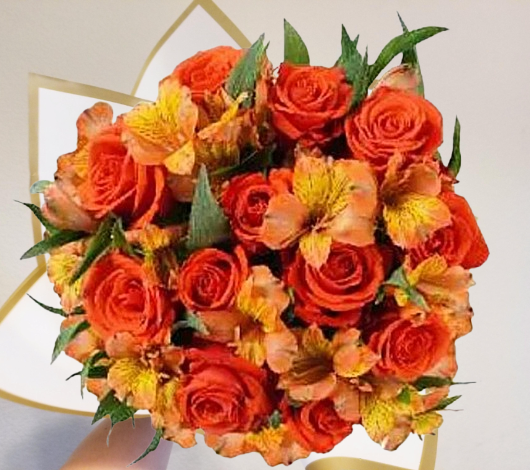 Bouquet of orange and yellow flowers with green leaves on a white background