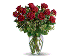 Premium Two Dozen Long Stem Fragrant Red Roses in Clear Vase