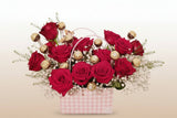 Sweet 16th Handbag Arrangement of fragrant 16 red Roses and 16 Ferrero Rocher Fine Hazelnut Chocolates