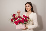 Sweet 16th Handbag Arrangement of fragrant 16 red Roses and 16 Ferrero Rocher Fine Hazelnut Chocolates