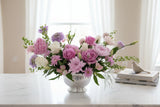 This is a sophisticated composition of Garden Roses and seasonal blooms, along with filler and greenery meticulously selected by our designers. 