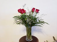 Half Dozen Roses Arrangement In Clear Vase