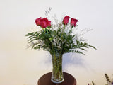 Half Dozen Roses Arrangement In Clear Vase