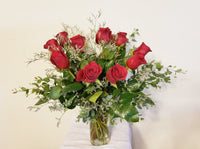 One Dozen Red Roses Arrangement In Clear Vase