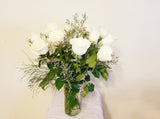 One Dozen White Roses Arrangement In Clear Vase