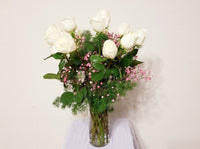 One Dozen White Roses Arrangement In Clear Vase