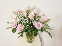 One Dozen Blush/Pink Roses Arrangement In Clear Vase