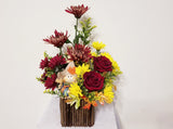 Molly - arrangement filled with roses, Chrysanthemums, and mums in the warm hues of fall