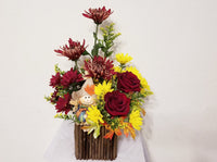 Molly - arrangement filled with roses, Chrysanthemums, and mums in the warm hues of fall