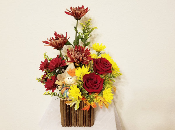 Molly -  arrangement filled with roses, Chrysanthemums, and mums in the warm hues of fall