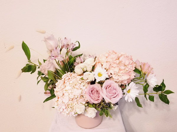 Angelynn is arrangement designed with gorgeous Hydrangeas, fragrant Roses, Alstroemerias, Daisy and a mix of beautiful textures.  Perfect for Thanks you, Birthday, Anniversary, and just because deliveries.