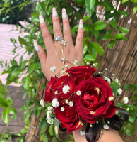 Red Spray Roses Corsage & Boutonniere with Black Ribbon & Gold Flakes